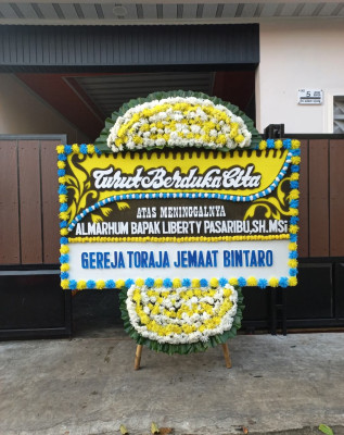 Papan Bunga Duka di Manuhing